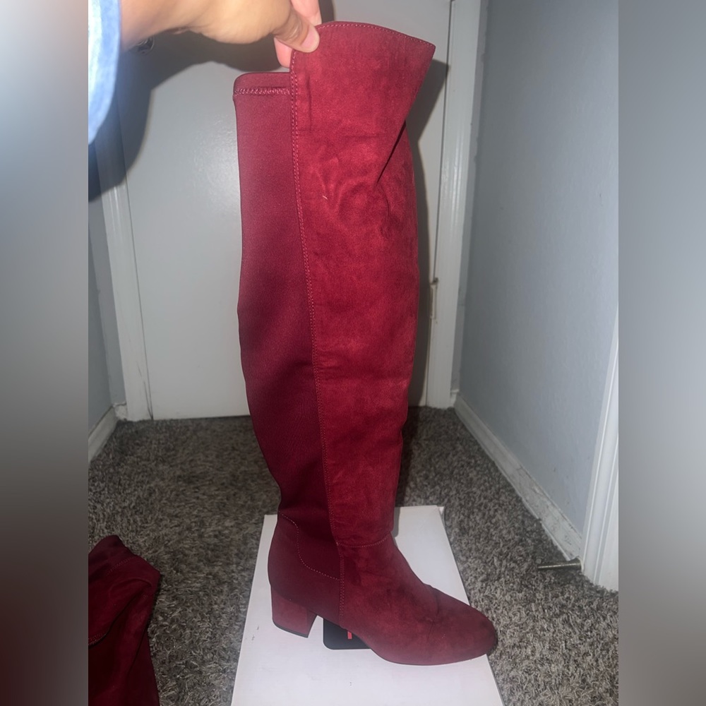 Slightly worn women's over the knee boots
